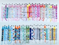 Attache-tétine bébé en tissu imprimé animaux colorés, motif dessin animé, avec sangle de jouet – Cadeau idéal pour bébé – Vente Flash