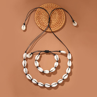Collier ras du cou en coquillages Puka faits à la main pour l'été à Hawaï, accessoires de mode océaniques, ensembles de bracelets en coquillages tressés de plage et coquillages cauris