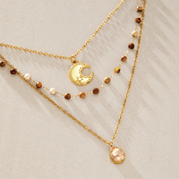 Collier superposé J&D Designer Stars Moon en acier inoxydable plaqué or 18 carats PVD, avec perles en œil de tigre et strass champagne
