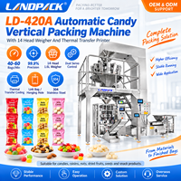 Automatische verticale machine voor het verpakken van palmolie, popcorn, zonnebloempitten, aardappelchips, snacks, pecannoten, snoep en andere voedingsmiddelen.