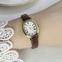 Montre à quartz pour femme de style vintage avec un petit cadran
