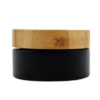 Pot à crème 30g 50g 100g en verre noir mat avec couvercle en bois pour les soins de la peau du visage, du corps et des yeux