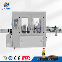 Machine d'étiquetage à colle chaude pour bouteilles en plastique et en verre, de type linéaire, haute précision, hautement compatible avec l'automatisation