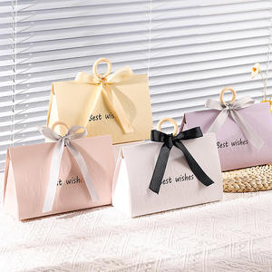 Sac cadeau de mariage en papier plié personnalisé, design exquis avec nœud, design boutique pour les occasions festives, fabricant professionnel - Product Image 1