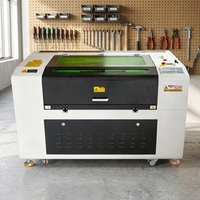 Produits de vente chaude 7050 graveur laser CO2 de haute précision et coupeur-refroidissement par eau Ruida Control CNC bois/verre non métallique