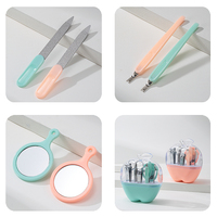 LMLTOP Set de manucure 9 en 1 en forme de pomme F0130 Lime à ongles en acier inoxydable Ciseaux à cuticules Beauty Clip Ear Pick Pedicure Set
