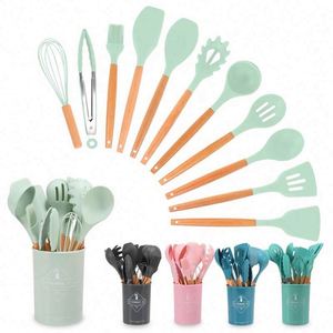 Juego de 12 utensilios de cocina al por mayor con soporte, espátula de silicona antiadherente y utensilios de repostería con mango de madera - Product Image 1