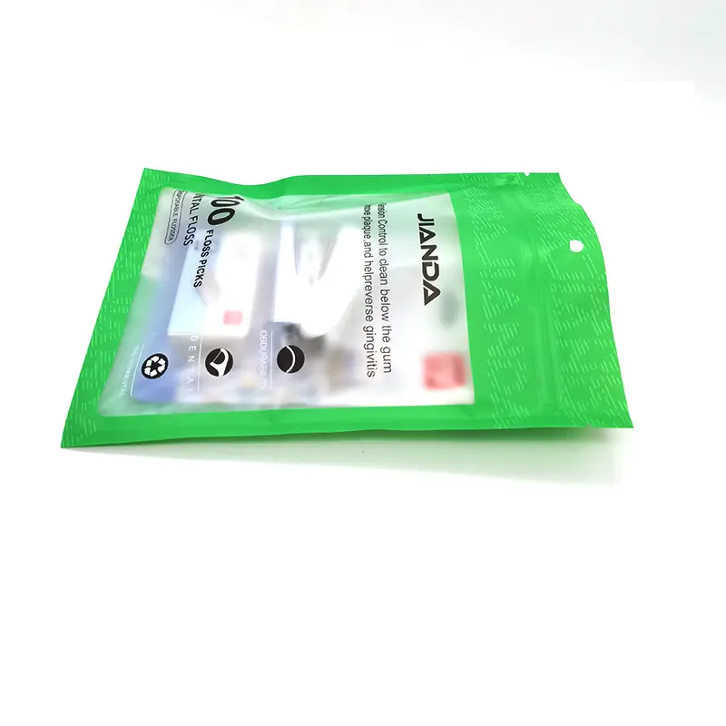 कस्टमाइज्ड लोगो प्लास्टिक डेंटल स्ट्रिंग फ्लॉस के साथ पारदर्शी पैकेजिंग बैग