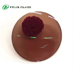 Lente Óptica de Resina FELIX OPTICAL Fotocromática de una Pieza 1.56 con Domedos Marrones, Recubrimiento Verde HMC, Curva Base 2C, Anti-UV420 y Anti-Luz Azul - Product Image 2