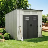 Maison conteneur démontable, grande remise extérieure à un étage avec fenêtre à persiennes pour le stockage sur camping