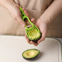 Multifunctionele handmatige slimme milieuvriendelijke PP makkelijk te reinigen huishoudmes fruit groente keukenhulp avocado snijder ontpitter boter