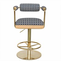 Tabouret de comptoir pivotant de luxe en ambre tressé avec assise rembourrée épaisse, base ronde à poteaux dorés et anneau à rayons, pour coin whisky