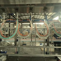 Machine de remplissage automatique à 6 têtes pour liquides (20 kg), avec 6 buses et levage servo, type pesage entièrement automatique