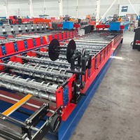 Machine de production de tôles de toiture IBR en Chine avec moteur, pompe et boîte de vitesses pour une production efficace et durable de tôles de toiture répondant aux normes de construction locales