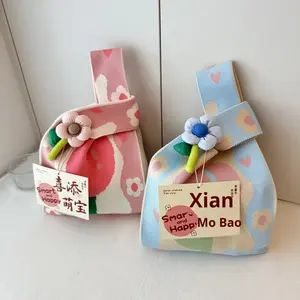Sac de bonbons de mariage de mode écologique en polyester tricoté à la main <span class=keywords><strong>cadeau</strong></span> promotionnel d'affaires du premier anniversaire des enfants du 100e jour du bébé - Product Image 1