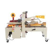 Machine complètement automatique de cachetage de carton de ruban adhésif pour le carton
