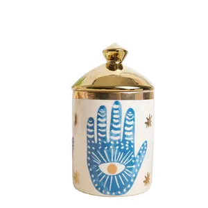 SYLVAN New Hot Sell Creative Ceramic Blue Eyes Painted Candle Jar With Gold Lid Porcelain Candle Container