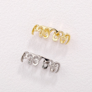 Grillz para dientes con diseño de estrellas en oro y plata, para fiestas, unisex, estilo hip hop. - Product Image 2