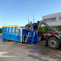 Grue de chargement avec benne à grappin pour benne à conteneurs