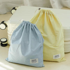 Bolsa de almacenamiento de viaje de algodón Yuan Ben, organizador de ropa ligero rectangular para viajes, diseño con cordón - Product Image 1