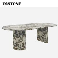 Table à manger ovale moderne en marbre blanc éléphant naturel Tostone avec pieds en pierre pour 6/8/10 places, prix de gros direct usine