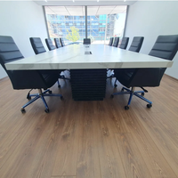 Tables de conférence 10-14 personnes Table de conférence de bureau en marbre Corian au design moderne avec chaises et prises