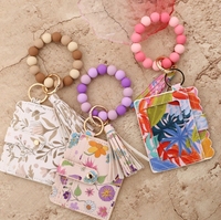 Nouveau porte-clés bracelet en perles PU avec étui à cartes imprimé – Pochette papillon pour femme pour la Saint-Valentin et le Nouvel An