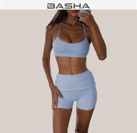 Ensemble de yoga rose de haute qualité pour femmes, comprenant un soutien-gorge push-up sexy sans dos et un short de course taille haute rehausseur de hanches, idéal pour le fitness et les activités sportives.