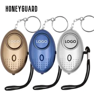 بيع بالجملة من مصنع HONEYGUARD أضواء LED متعددة الألوان 130dB سلسلة مفاتيح لحماية سلامة الصوت إنذار شخصي للنساء