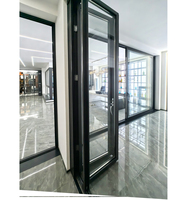 Système de porte coulissante pliante insonorisée en aluminium à rupture de pont thermique, certifiée CE, étanche pour extérieur, pour balcon, villa/commercial