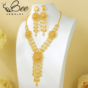 Conjunto de joyería nupcial de lujo y elegante, de aleación, con cuentas en color oro de 18K, collar largo y aretes grandes, para fiesta de noche. - Product Image 1