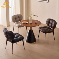 Chaise de salle à manger moderne en similicuir PU capitonnée, avec dossier à motif bulles et assise rembourrée douce, pieds en métal noir, pour la maison et le salon