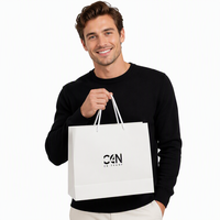 Achat en gros personnalisé de sacs en papier cosmétiques à main, sacs en papier d'emballage, matériaux écologiques, impression