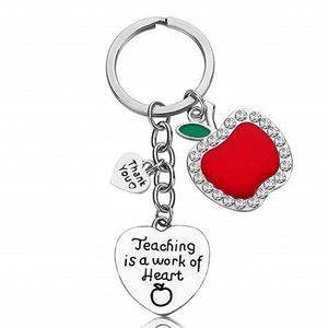 Dạy học là một công việc của trá<span class=keywords><strong>i</strong></span> tim Keychain trở lạ<span class=keywords><strong>i</strong></span> trường học quà tặng cho giáo viên móc chìa khóa kim loạ<span class=keywords><strong>i</strong></span> quà tặng ngày của giáo viên đánh giá cao giáo viên - Product Image 6