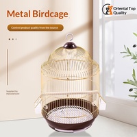 Vente en gros d'usine, cage à oiseaux en fer plaqué or, cage ornementale moyenne, cage ronde dorée pour perroquets et oiseaux