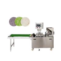 Machine automatique pour la fabrication de tortillas mexicaines à base de farine de maïs.