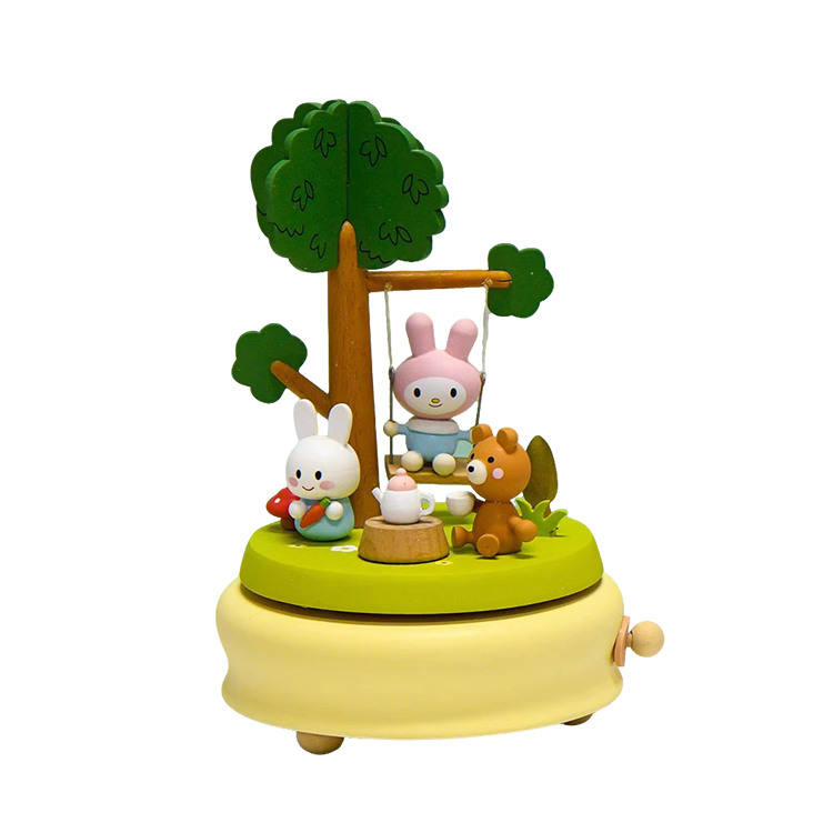 52705401 Boîte à musique en bois Swing lapin avec plateau tournant.