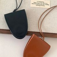 Étui de protection multicolore en cuir PU ShengYI pour lunettes de soleil, style rétro minimaliste, à suspendre au cou, avec cordon