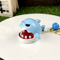 Mini porte-clés jeu Requin à mordre au doigt, jouet anti-stress amusant à presser avec des dents, avec clochette et pendentif de sac
