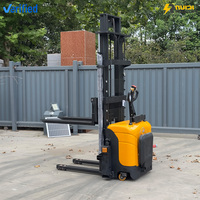 Penumpuk Pallet Listrik 1.5T Baterai Asam Timbal Pengangkat Lorong Sempit Kompak Kaki Penyangga Hidrolik untuk Penggunaan Dalam Ruangan