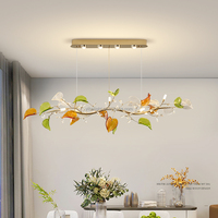 Lustre suspendu LED de luxe haut de gamme en fer forgé pour bureau à domicile, avec fleurs en cristal K9 colorées et cadre doré