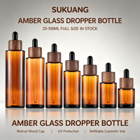 Flacon compte-gouttes en verre ambré à épaule plate avec anneau en bois de noyer 20ml-100ml en stock