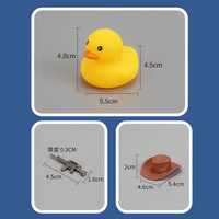 Jouets de bain en caoutchouc PVC en gros, mini-canard jaune cowboy western avec pistolet BBT047