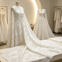 Tissu en polyester sergé brodé de dentelle florale ajourée découpée au laser pour vêtements et robes