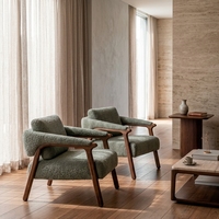 Fauteuil d'appoint moderne et durable en tissu rembourré avec structure en bois et design capitonné pour hôtels, appartements, villas et salons