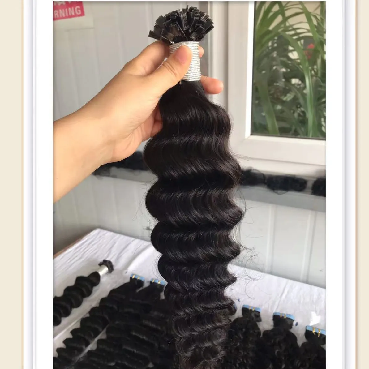 Nastro ondulato per estensione dei capelli in capelli grezzi a punta piatta 100g per confezione 1g per pezzo e lunghezza dal produttore dei capelli
