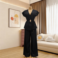 Ensemble élégant deux pièces pour femme, vente en gros d'usine, décontracté d'été, sans manches, avec ceinture, gilet et pantalon large, couleur unie, idéal pour le bureau