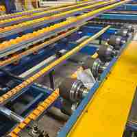 Machine de fabrication de panneaux composites en laine de roche et mousse EPS avec double unité de formage et de laminage
