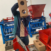 Vente directe d'usine Prix le plus bas Petite machine manuelle de fabrication de blocs de briques 2-40 à emboîtement dans un sol argileux à bas prix