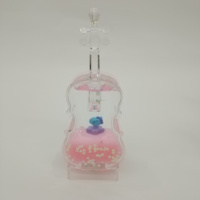 Support à stylos en acrylique style violoncelle exquis, avec liquide et paillettes flottantes, figurine adorable à l'intérieur, attrayant l'attention